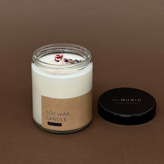 Rose Kerze im Votivglas